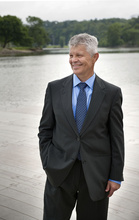 Witold Krajewski smiles with the river in the background.